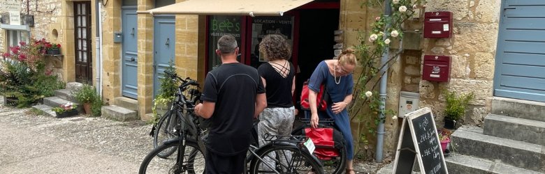 people getting their bikes ready before starting their self guided trip with european bike tours